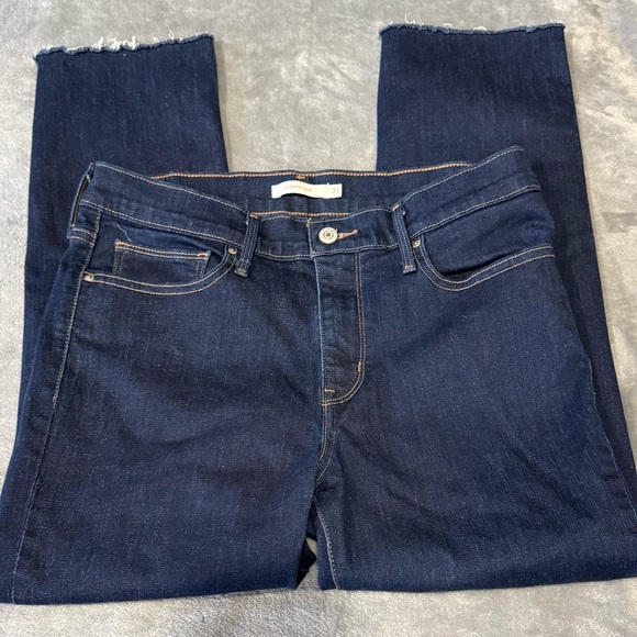 Levi's Slimming Slim Raw Hem Dark Jeans - Picture 2 of 8